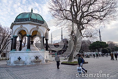 Street view from Sultanahmet Square. Foreign and local tourists coming to see the Blue Mosque Sultanahmet Camii and Square. Editorial Stock Photo