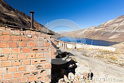 Street village town stone buildings old abandoned houses, lake, Bolivia. Stock Photo