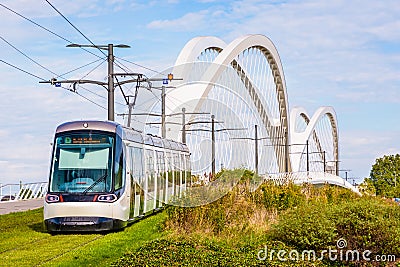 A streetcar is about to cross the railway bridge between Strasbourg in France and Kehl in Germany Editorial Stock Photo