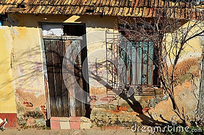 Streets of colonial Trinidad and some destroyed houses, Cuba Stock Photo