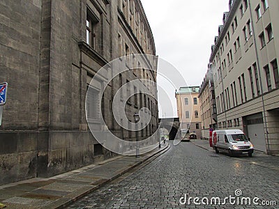 Streets of Dresden. The house and the arch are made of rapidly darkening sandstone. Germany. Editorial Stock Photo
