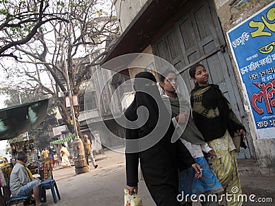 Streets of Kolkata. Muslim woman in burkha Editorial Stock Photo