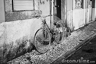 Streets of Lisbon. Old bicycle. Black and white photo. B&W. Street photography Stock Photo