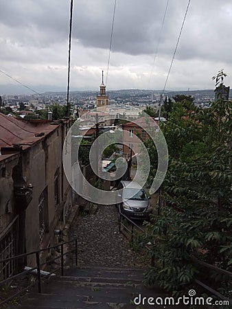 The streets of the Old City and the view of Tbilisi from the mountain. Stock Photo