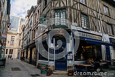 On the streets of the old town of Rouen with traditional half-timbered heritage houses. Rouen, Normandy, France Editorial Stock Photo