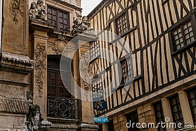 On the streets of the old town of Rouen with traditional half-timbered heritage houses. Rouen, Normandy, France Editorial Stock Photo