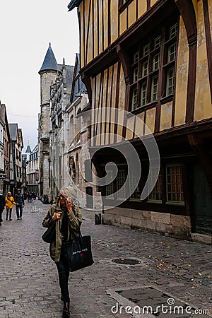 On the streets of the old town of Rouen with traditional half-timbered heritage houses. Rouen, Normandy, France Editorial Stock Photo