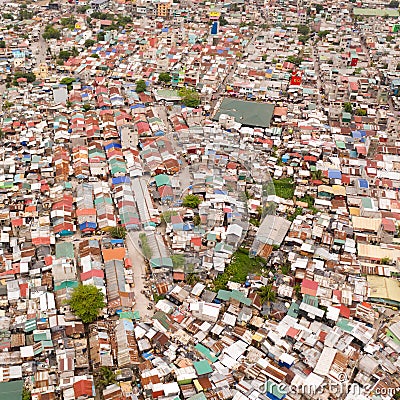 Streets of poor areas in Manila. The roofs of houses and the life of people in the big city. Poor districts of Manila, view from Stock Photo