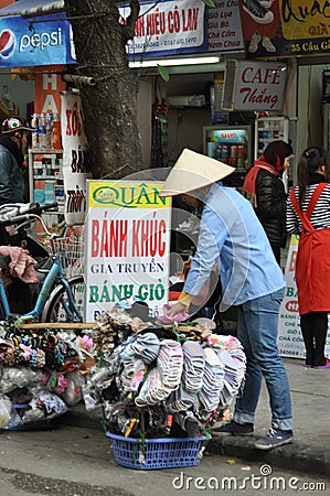 Streets of Vietnam - Clothing accessories seller Editorial Stock Photo