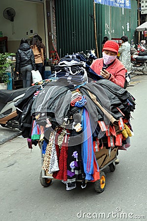 Streets of Vietnam - Clothing seller Editorial Stock Photo