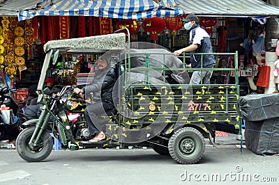 Streets of Vietnam with motorized rickshaw - Hanoi market Editorial Stock Photo