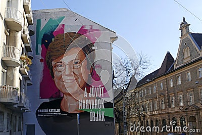 Streetview in Budapest, Hungary with wall painting of the Hungarian biochemist Katalin Kariko. Editorial Stock Photo