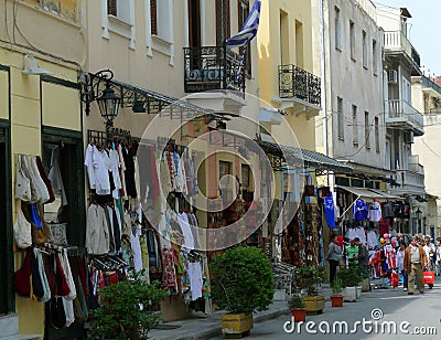 Streetview of outdoor shopping market with people walking in Athens, Greece Editorial Stock Photo