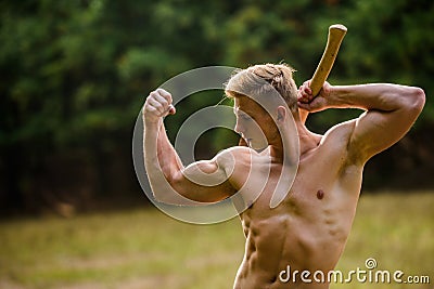 Strength and power concept. Handsome shirtless man muscular body. Forester with axe. Sexy macho bare torso. Surviving in Stock Photo