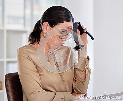 Stress, call center and woman with burnout in customer service, telemarketing and receptionist headset at desk. Crm Stock Photo