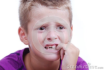 Stress expression on little blond kid's face Stock Photo