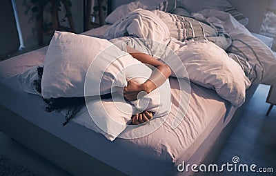 Stress, insomnia and woman with pillow on face, tired and frustrated with sleep, nightmare or dream. Fatigue, sleeping Stock Photo