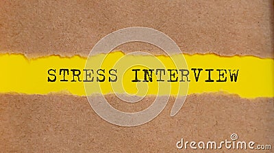 STRESS INTERVIEW message written under torn paper. Business, technology Stock Photo