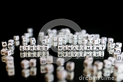 Stress management text from white tiled letters Stock Photo