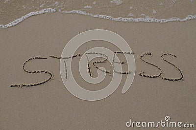 Stress text inscription in the sand Stock Photo