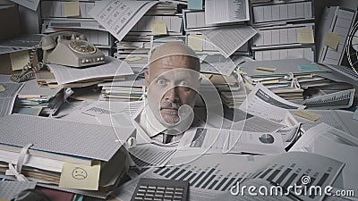 Stressed accountant overwhelmed by work Stock Photo