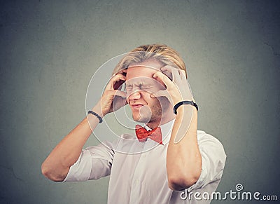 Stressed anxious man feeling overwhelmed Stock Photo