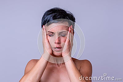 Stressed anxious woman with a headache Stock Photo