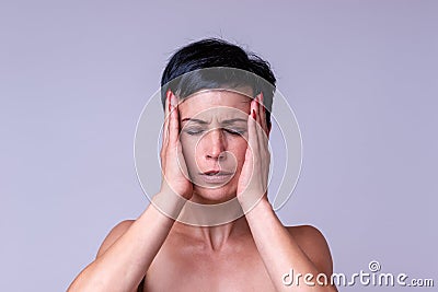 Stressed anxious woman with a headache Stock Photo