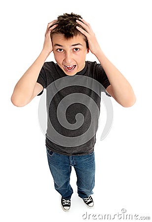 Stressed boy hands to head Stock Photo