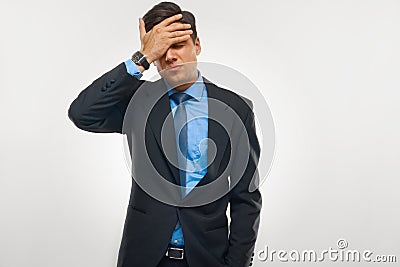 Stressed Businessman against white background Stock Photo