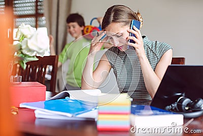 Stressed Businesswoman forced to work from home during lockdown Stock Photo