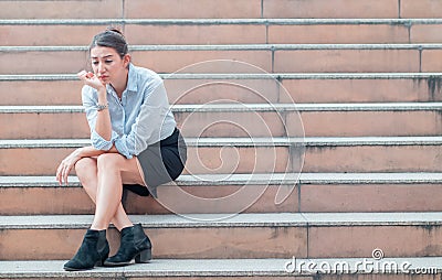 stressed employee, businesswoman, holding his forehead in stress After fired from work and failed in busines Stock Photo