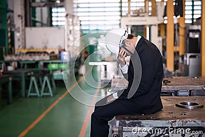 Stressed Factory manager owner crying Stock Photo