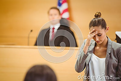 Stressed lawyer with head bowed Stock Photo