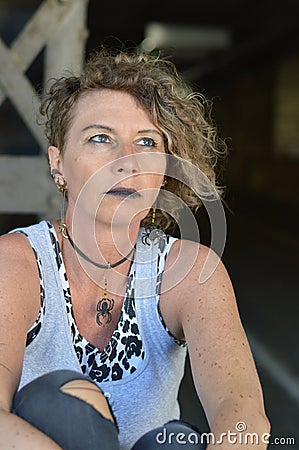 Stressed mature punk lady Stock Photo