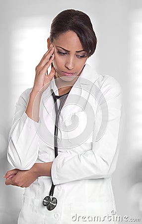 Stressed out female doctor looks upset. Stock Photo