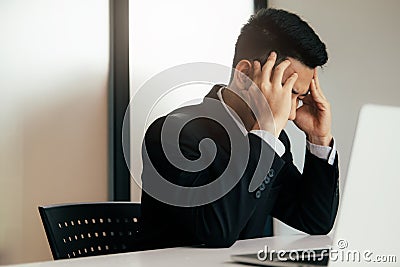 Stressed overwork business man in the office. Stock Photo