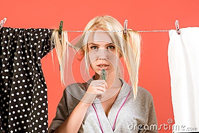 Stressed retro housewife. Maid or housewife cares about house. Multitasking mom. Performing Different Household Duties Stock Photo