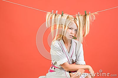 Stressed retro housewife. Maid or housewife cares about house. Vintage housekeeper woman. Busy mother. Multitasking mom Stock Photo