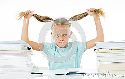 Stressed schoolgirl overwhelmed with too much homework hatting studying and school Stock Photo