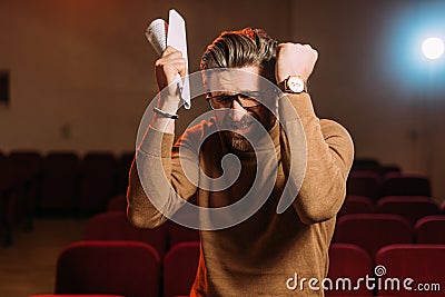 Stage director with scenario on rehearse Stock Photo