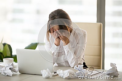 Stressed tired businesswoman having writers block or lack of ide Stock Photo