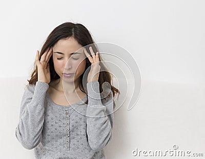 Stressed woman has headache Stock Photo