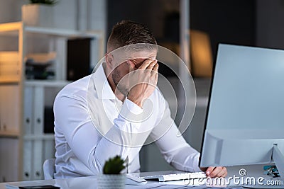 Stressful Business Man Working On Laptop Stock Photo