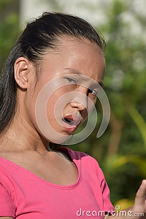 A Stressful Cute Asian Female Youngster Stock Photo