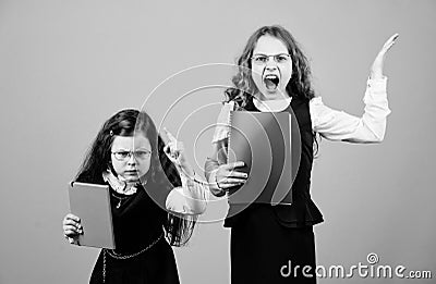 Stressful day at school. Education is what remains after one has forgotten what one has learned in school. Girls school Stock Photo