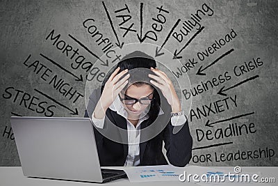 Stressful Indian entrepreneur thinks problems Stock Photo