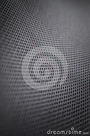 Stretched grey mesh textured polyester fabric. Stock Photo