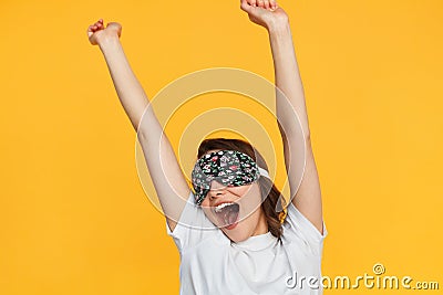 Stretching woman in sleeping mask Stock Photo