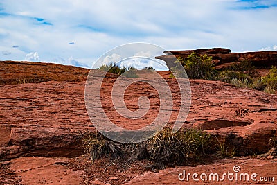 Striated red sandstone formation in the Arizona desert Stock Photo